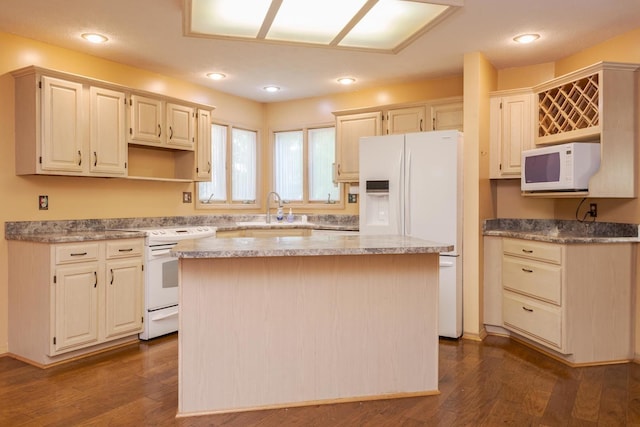 2321 Woodhavens Dr, Bloomington, IL 61701 - kitchen featuring white appliances, dark wood finished floors, a kitchen island, and recessed lighting