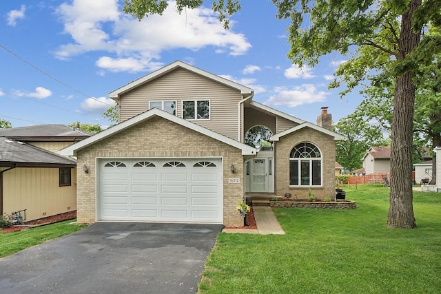 16212 Forest Ave, Oak Forest, IL 60452 - traditional-style house with brick siding, asphalt driveway, a front yard, and an attached garage