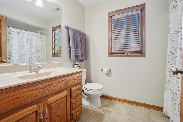 16212 Forest Ave, Oak Forest, IL 60452 - full bathroom featuring vanity, toilet, and baseboards