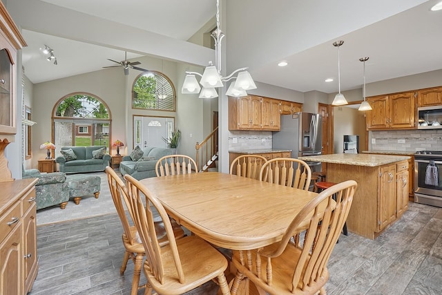 16212 Forest Ave, Oak Forest, IL 60452 - dining space featuring ceiling fan, light wood-style flooring, recessed lighting, and high vaulted ceiling