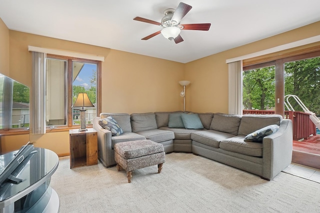 16212 Forest Ave, Oak Forest, IL 60452 - living room featuring plenty of natural light, ceiling fan, and light carpet