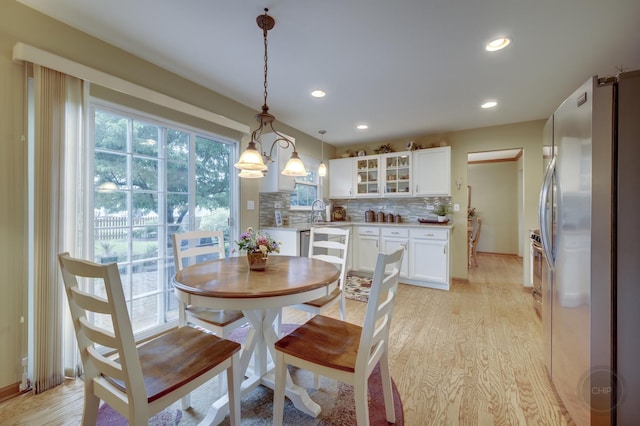 2693 Barrington Dr, Aurora, IL 60503 - dining area featuring light wood finished floors, recessed lighting, and baseboards