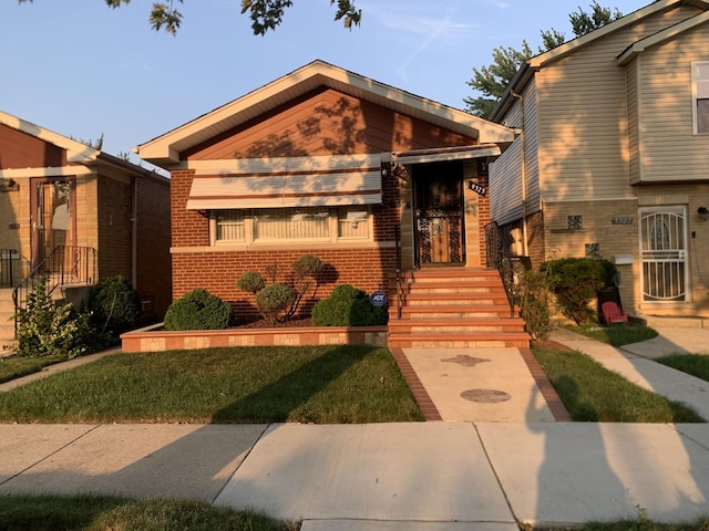9323 S Normal Ave, Chicago, IL 60620 - view of front of property featuring brick siding