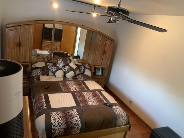 9323 S Normal Ave, Chicago, IL 60620 - bedroom featuring wood finished floors, baseboards, and arched walkways