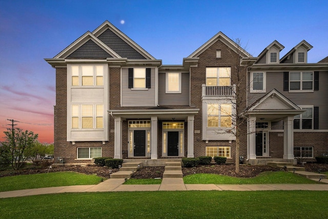 1413 N Charles Ave, Naperville, IL 60563 - townhome / multi-family property featuring brick siding and a front yard