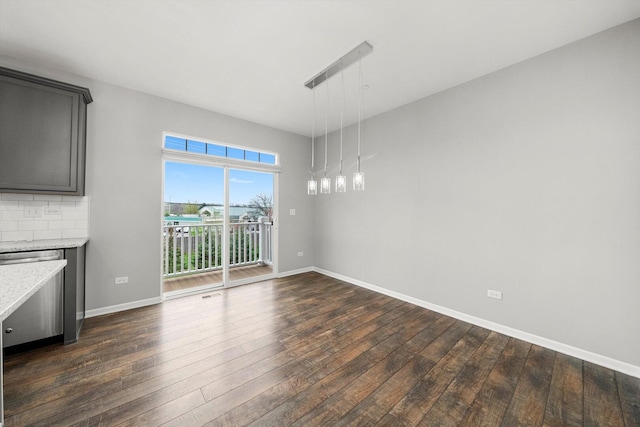1413 N Charles Ave, Naperville, IL 60563 - unfurnished dining area with dark wood-style floors and baseboards