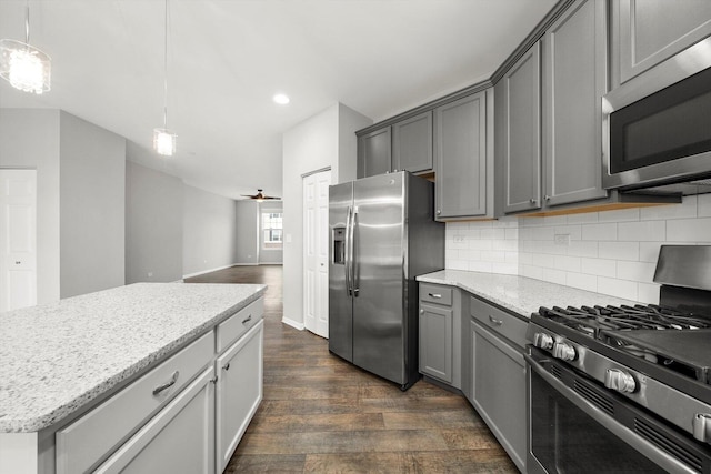 1413 N Charles Ave, Naperville, IL 60563 - kitchen featuring stainless steel appliances, gray cabinets, dark wood finished floors, recessed lighting, and tasteful backsplash