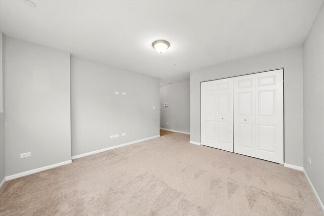 1413 N Charles Ave, Naperville, IL 60563 - unfurnished bedroom featuring carpet flooring, baseboards, and a closet