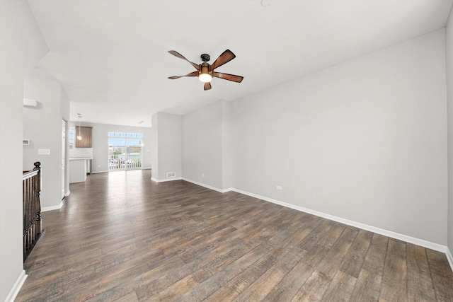 1413 N Charles Ave, Naperville, IL 60563 - unfurnished living room featuring a ceiling fan, dark wood-style flooring, and baseboards