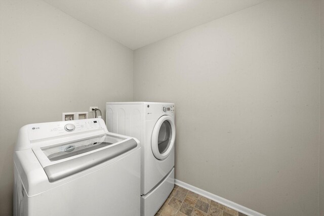 1413 N Charles Ave, Naperville, IL 60563 - washroom with separate washer and dryer, baseboards, and stone finish flooring