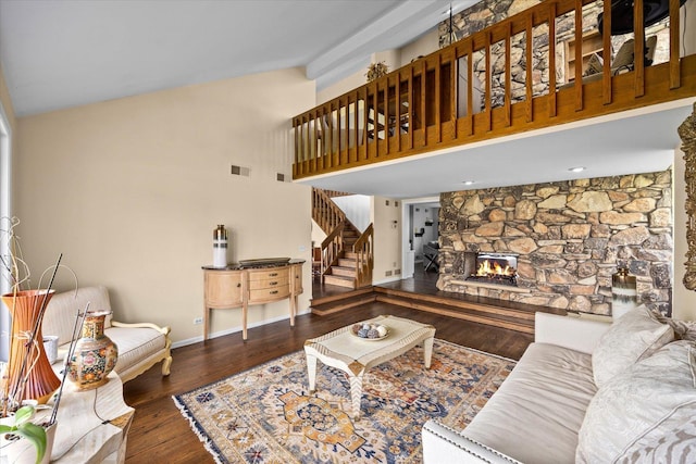 7 Surrey Rd, Lemont, IL 60439 - living room with high vaulted ceiling, hardwood / wood-style flooring, a stone fireplace, stairway, and baseboards