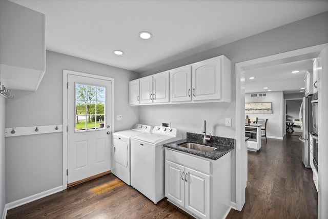 7 Surrey Rd, Lemont, IL 60439 - laundry room featuring washer and clothes dryer, cabinet space, dark wood-style flooring, recessed lighting, and baseboards