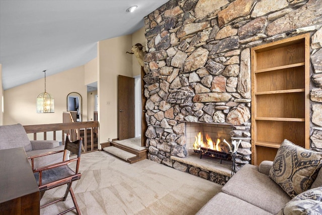 7 Surrey Rd, Lemont, IL 60439 - living room with vaulted ceiling, carpet floors, a stone fireplace, and a chandelier