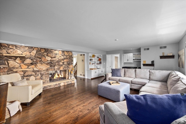 7 Surrey Rd, Lemont, IL 60439 - living room with dark wood-style floors and a fireplace