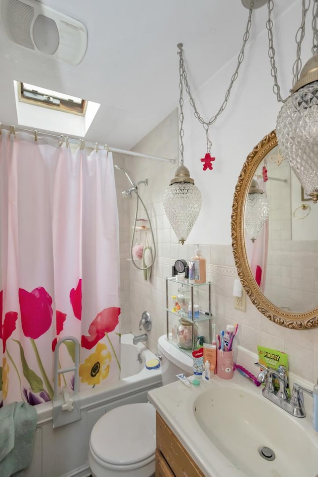17963 W Greentree Rd, Grayslake, IL 60030 - bathroom with a skylight, shower / tub combo, vanity, toilet, and tile walls