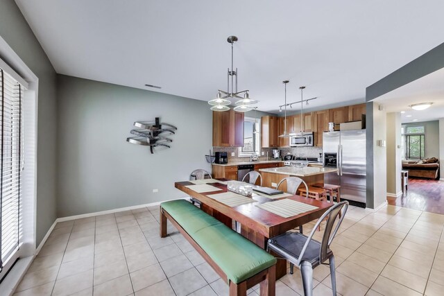 3159 W Washington Blvd, Chicago, IL 60612 - dining space with light tile patterned floors and baseboards