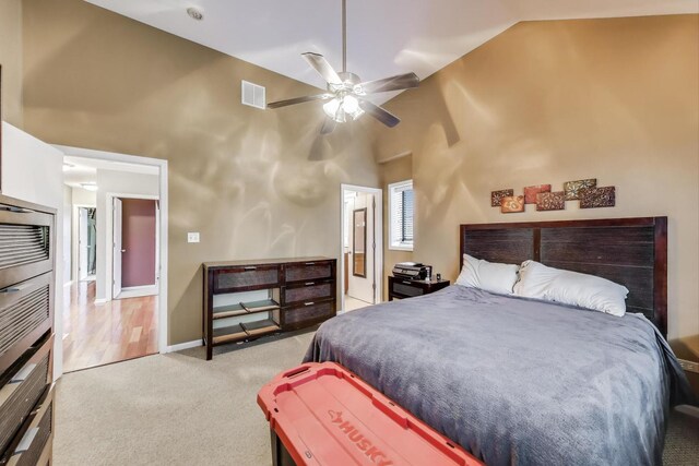 3159 W Washington Blvd, Chicago, IL 60612 - bedroom with high vaulted ceiling, carpet flooring, ceiling fan, and baseboards