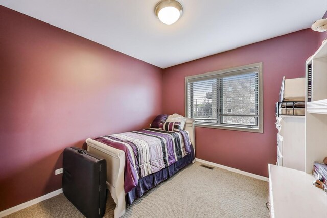 3159 W Washington Blvd, Chicago, IL 60612 - carpeted bedroom featuring baseboards