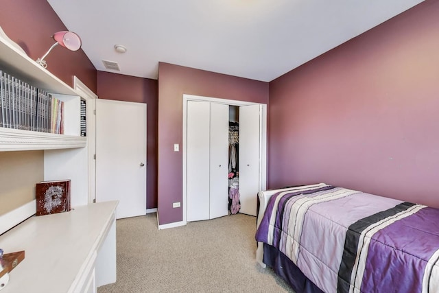 3159 W Washington Blvd, Chicago, IL 60612 - bedroom with light colored carpet, a closet, and baseboards