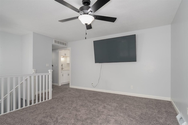 817 N Mohave Dr, Pontiac, IL 61764 - carpeted spare room with a ceiling fan and baseboards