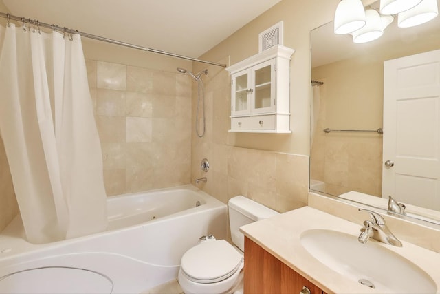 4751 N Artesian Ave Unit 206, Chicago, IL 60625 - bathroom with toilet, shower / tub combo, vanity, and tile walls