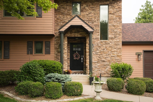 2148 Donahue St, Lasalle, IL 61301 - property entrance featuring stone siding and roof with shingles