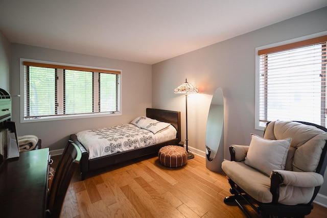 2148 Donahue St, Lasalle, IL 61301 - bedroom with multiple windows, wood finished floors, and baseboards