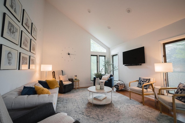 2148 Donahue St, Lasalle, IL 61301 - living room with high vaulted ceiling, light wood-style flooring, and baseboards