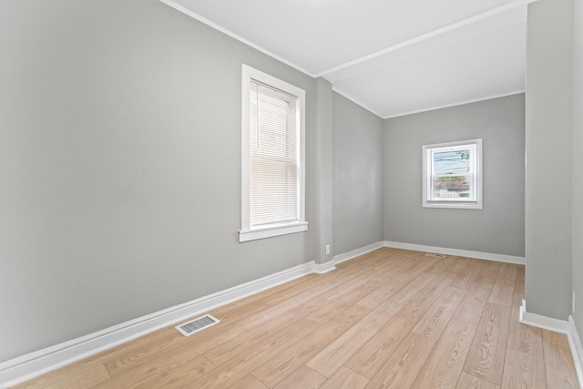 8837 S Morgan St, Chicago, IL 60620 - spare room with crown molding, light wood-type flooring, and baseboards