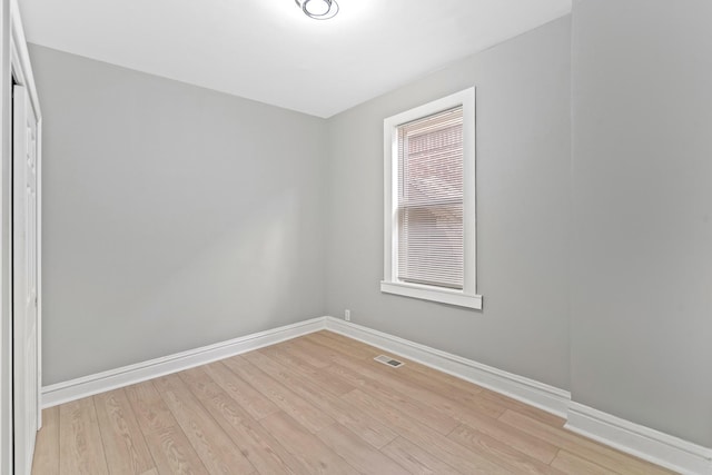 8837 S Morgan St, Chicago, IL 60620 - empty room with light wood-type flooring and baseboards