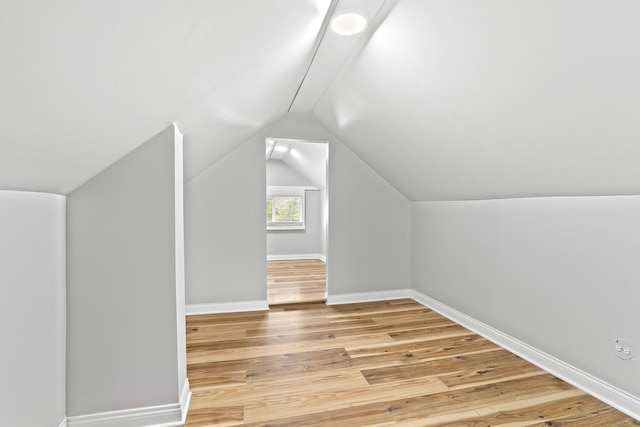 8837 S Morgan St, Chicago, IL 60620 - bonus room with light wood-style floors, lofted ceiling, and baseboards