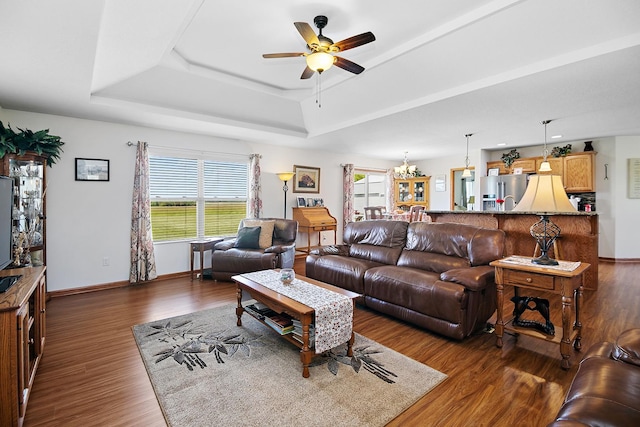 2609 E 1500s Rd, Kankakee, IL 60901 - living room with a raised ceiling, ceiling fan, wood finished floors, and baseboards