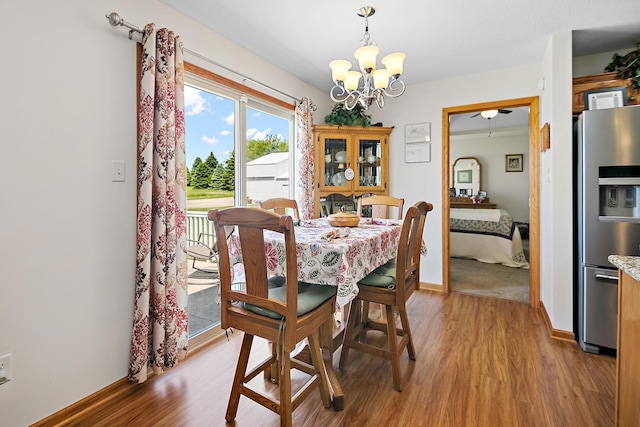 2609 E 1500s Rd, Kankakee, IL 60901 - dining area featuring a chandelier, light wood-style flooring, baseboards, and a ceiling fan