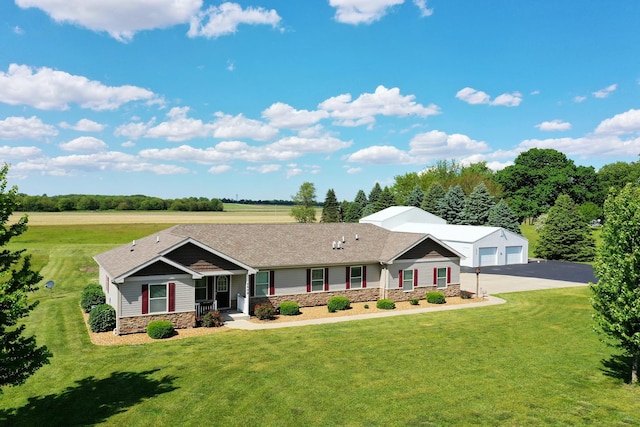 2609 E 1500s Rd, Kankakee, IL 60901 - view of front of house with stone siding, a front yard, a garage, and covered porch