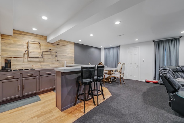 17964 Upland Dr, Tinley Park, IL 60487 - kitchen with wood walls, a kitchen breakfast bar, open floor plan, recessed lighting, and beamed ceiling