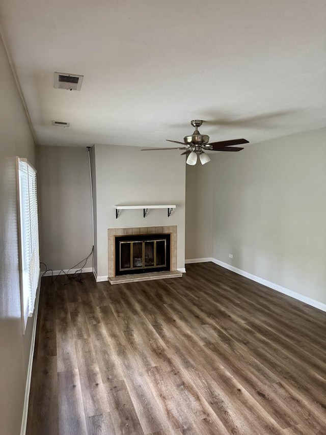 716 Shining Water Dr, Carol Stream, IL 60188 - unfurnished living room featuring wood finished floors, a tile fireplace, and a ceiling fan