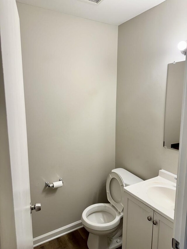 716 Shining Water Dr, Carol Stream, IL 60188 - half bathroom featuring wood finished floors and vanity