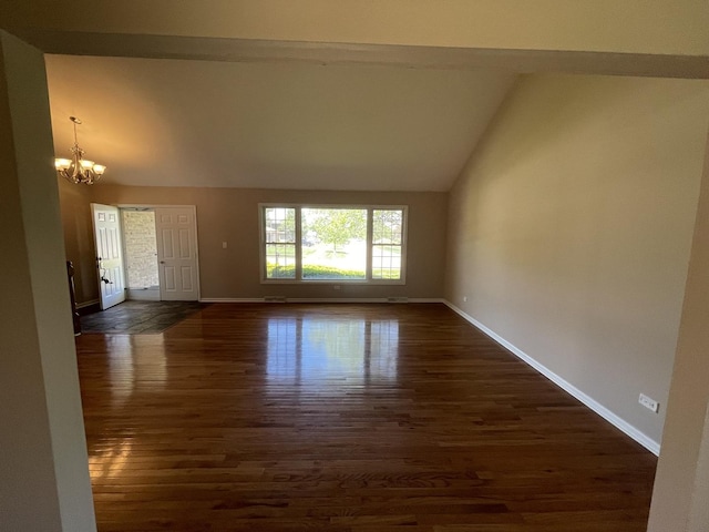 13153 W Pin Oak Dr, Homer Glen, IL 60491 - unfurnished living room featuring a chandelier, dark wood-style floors, baseboards, and high vaulted ceiling