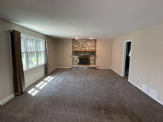 13153 W Pin Oak Dr, Homer Glen, IL 60491 - unfurnished living room featuring carpet, a brick fireplace, baseboards, and wooden walls
