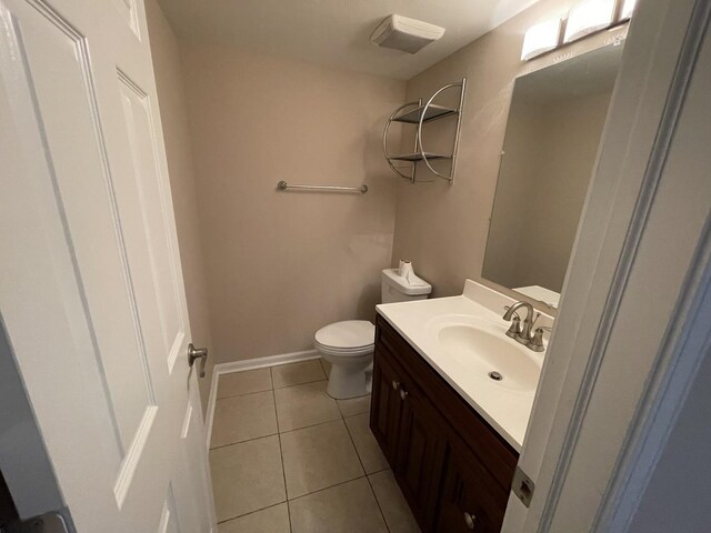 13153 W Pin Oak Dr, Homer Glen, IL 60491 - bathroom with vanity, tile patterned flooring, toilet, and baseboards