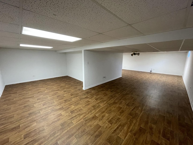 13153 W Pin Oak Dr, Homer Glen, IL 60491 - finished below grade area with wood finished floors, a paneled ceiling, and baseboards