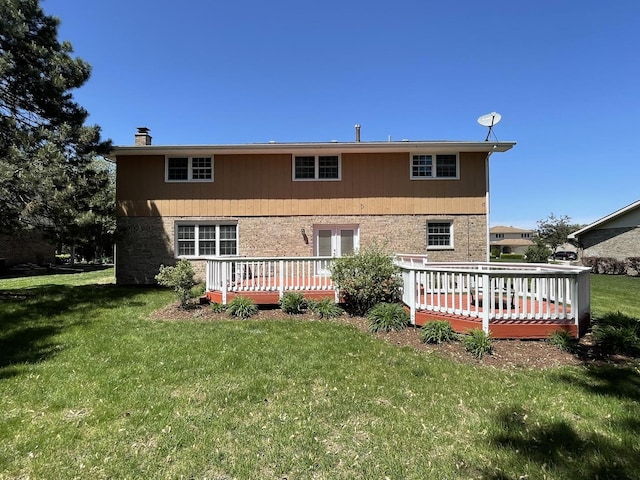 13153 W Pin Oak Dr, Homer Glen, IL 60491 - back of house featuring a deck, a chimney, a yard, and brick siding