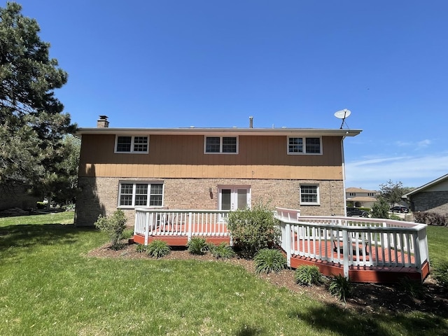 13153 W Pin Oak Dr, Homer Glen, IL 60491 - back of property featuring a wooden deck, a yard, brick siding, and a chimney