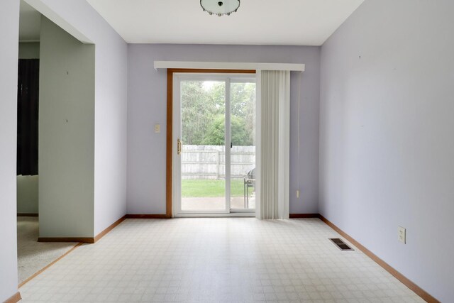 1560 Hunt Dr Unit A, Normal, IL 61761 - carpeted spare room with baseboards