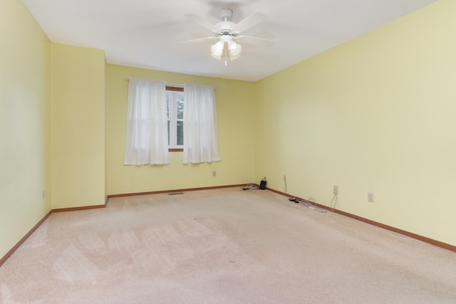 1560 Hunt Dr Unit A, Normal, IL 61761 - carpeted empty room featuring baseboards and ceiling fan