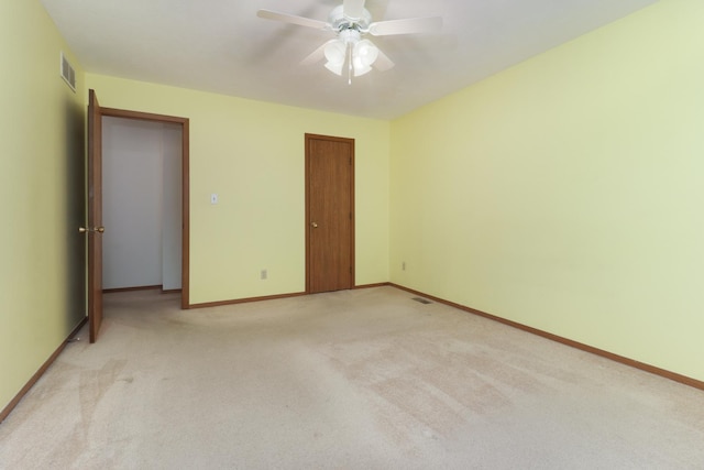 1560 Hunt Dr Unit A, Normal, IL 61761 - unfurnished bedroom featuring light carpet, baseboards, and a closet