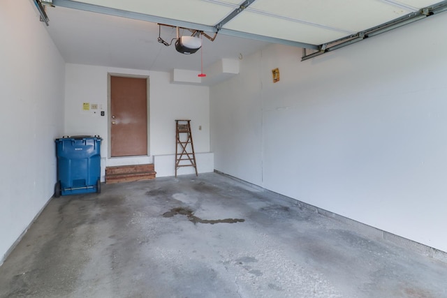 1560 Hunt Dr Unit A, Normal, IL 61761 - garage featuring a garage door opener