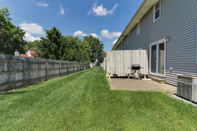 1560 Hunt Dr Unit A, Normal, IL 61761 - view of yard featuring central AC unit and a patio