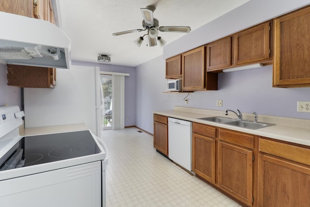 1560 Hunt Dr Unit A, Normal, IL 61761 - kitchen with white appliances, range hood, a sink, a ceiling fan, and light countertops