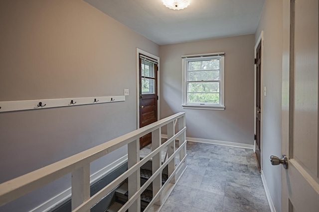 1223 S 3rd St, Saint Charles, IL 60174 - hallway with baseboards and stone finish floors